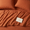 Warm rust bed linen set seen from above