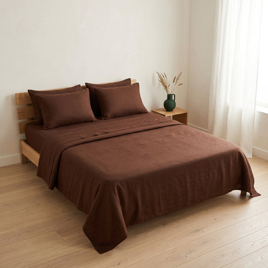 Double bed made up in the full deep brown linen set