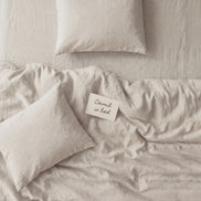 Pale oatmeal washed linen bedding set, product photograph