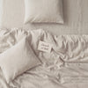 Pale oatmeal washed linen bedding set, product photograph