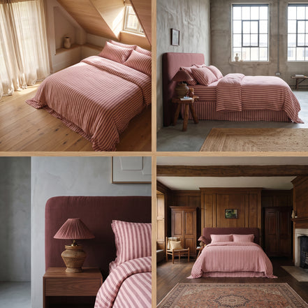 Terracotta striped duvet cover styled on a bed in a softly lit room