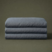Slate grey linen folded into a neat block