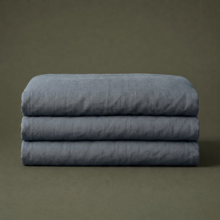 Slate grey linen folded into a neat block