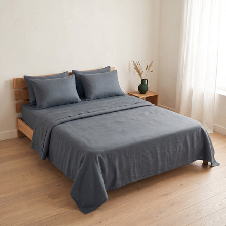 Double bed made up in the full slate grey linen set