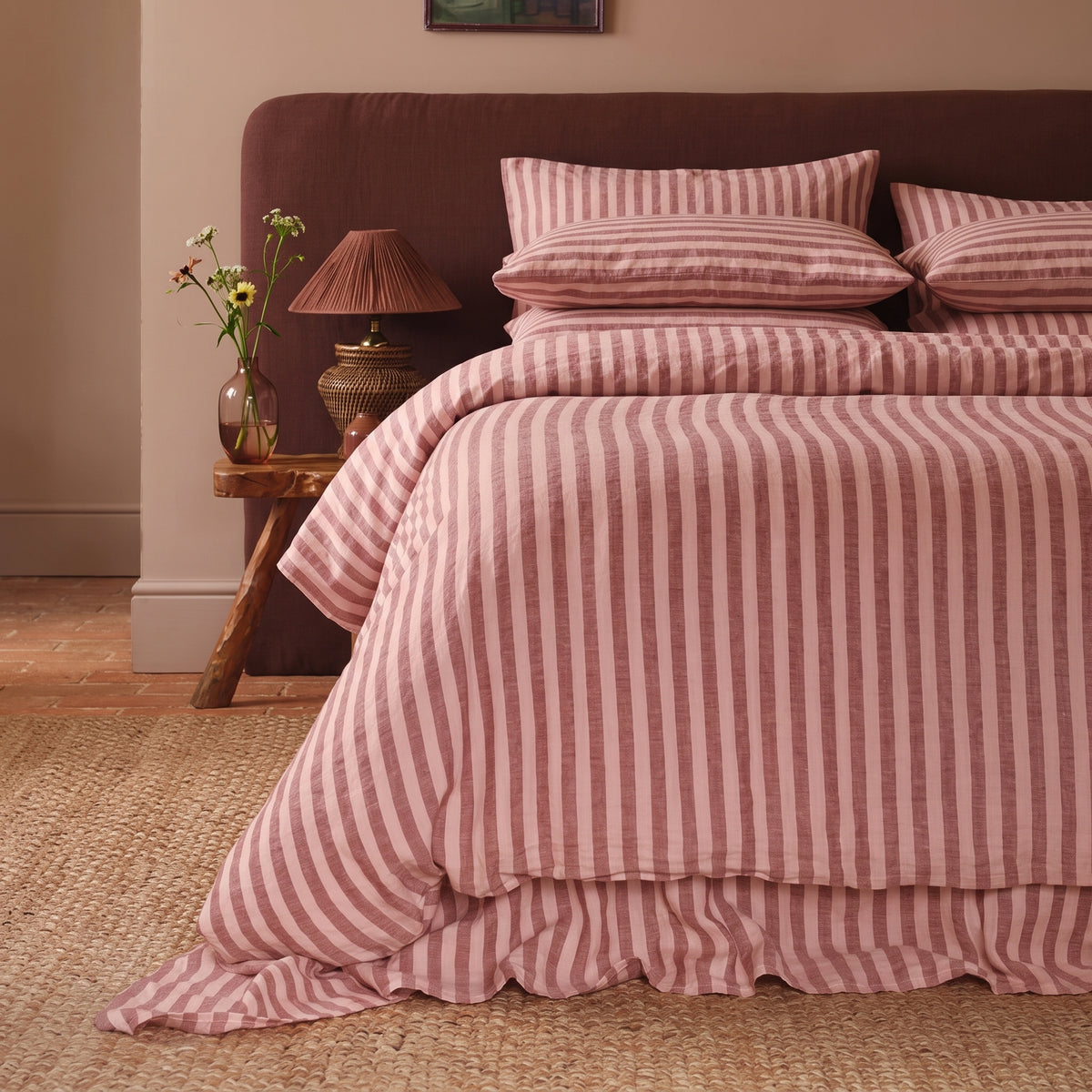 Double bed made up in the full terracotta striped linen set